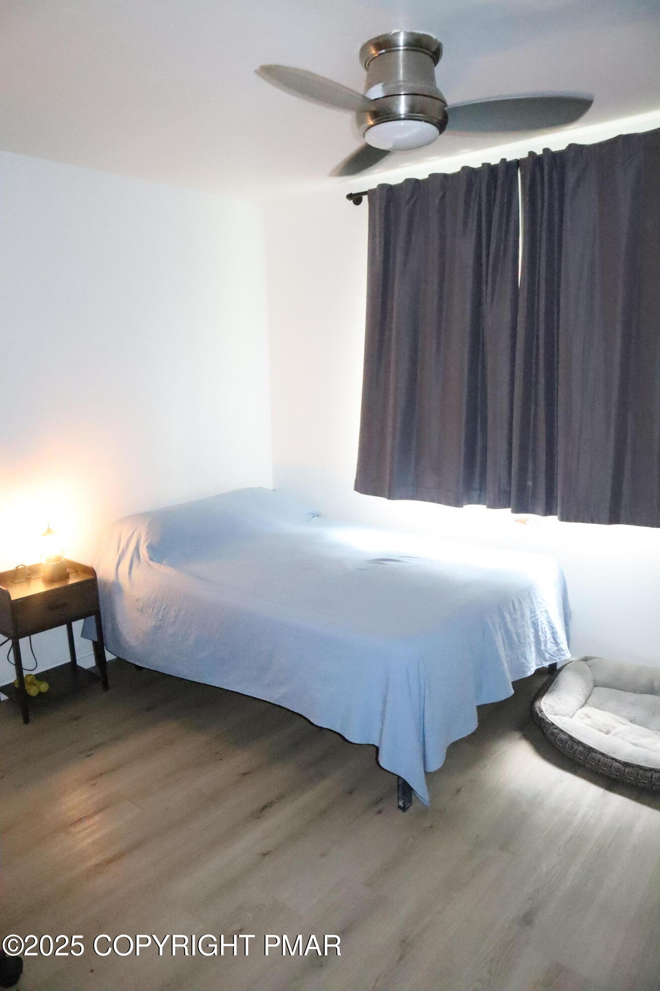 2116 Bobolink Trail Bushkill, PA 18324 - Photo 12 of 19 a bedroom with a bed and a table