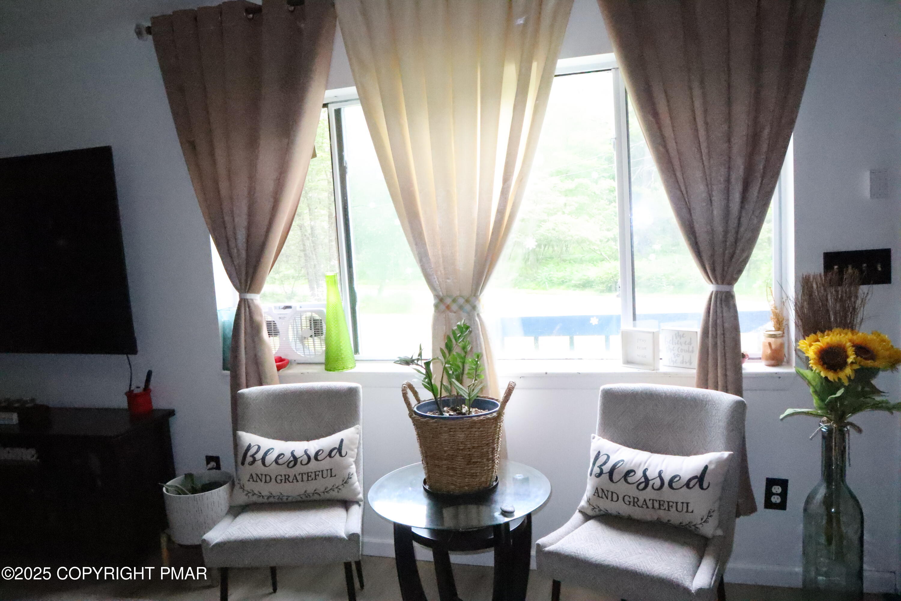 2116 Bobolink Trail Bushkill, PA 18324 - Photo 3 of 19 a dining room with furniture window and outside view