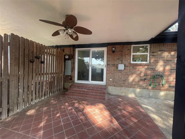 a view of an entryway door front of a house