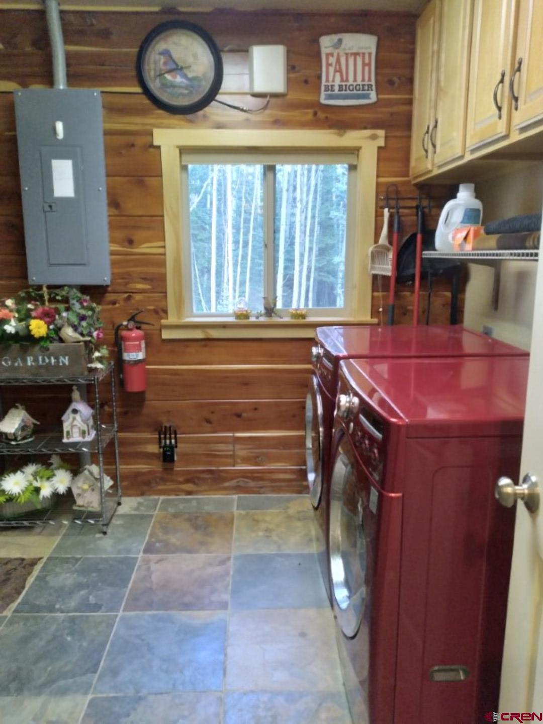 100 Crest Drive Cimarron, CO 81220 - Photo 16 of 35 a bathroom with a sink and a mirror