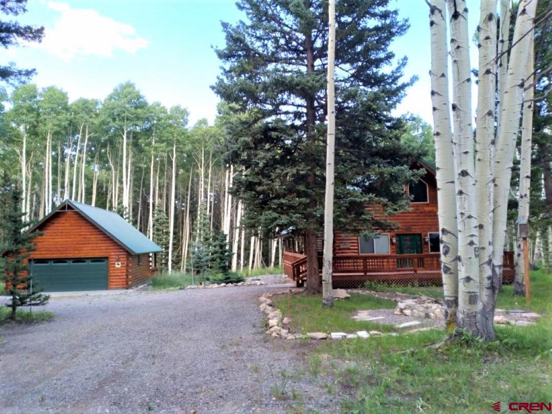 100 Crest Drive Cimarron, CO 81220 - Photo 31 of 35 a house view with a garden space