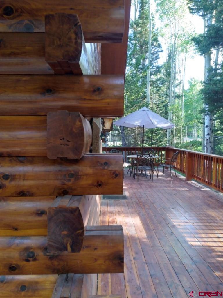 100 Crest Drive Cimarron, CO 81220 - Photo 32 of 35 a roof deck view with a seating space