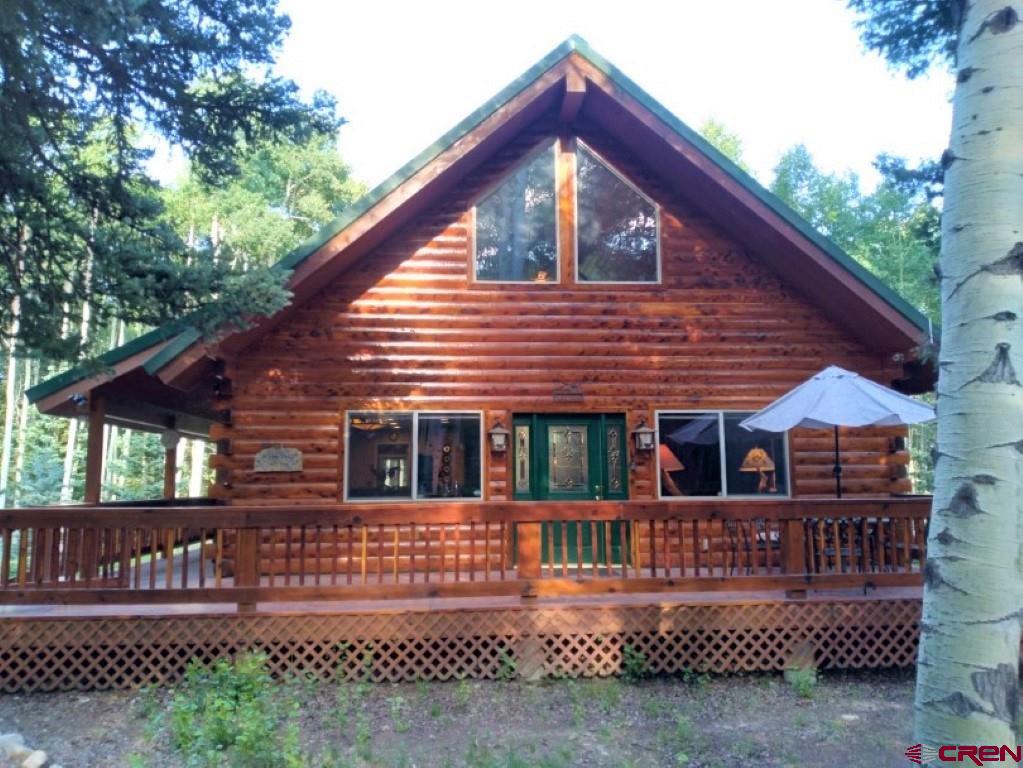 100 Crest Drive Cimarron, CO 81220 - Photo 33 of 35 a front view of a house with balcony