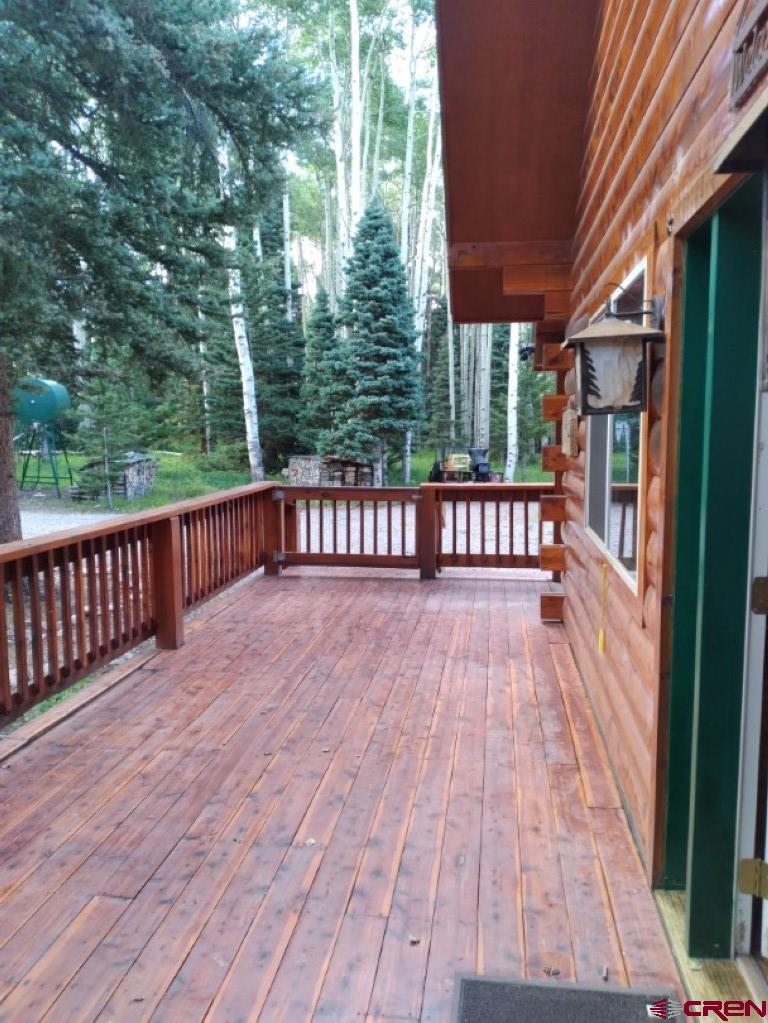 100 Crest Drive Cimarron, CO 81220 - Photo 35 of 35 a view of outdoor space with deck and backyard
