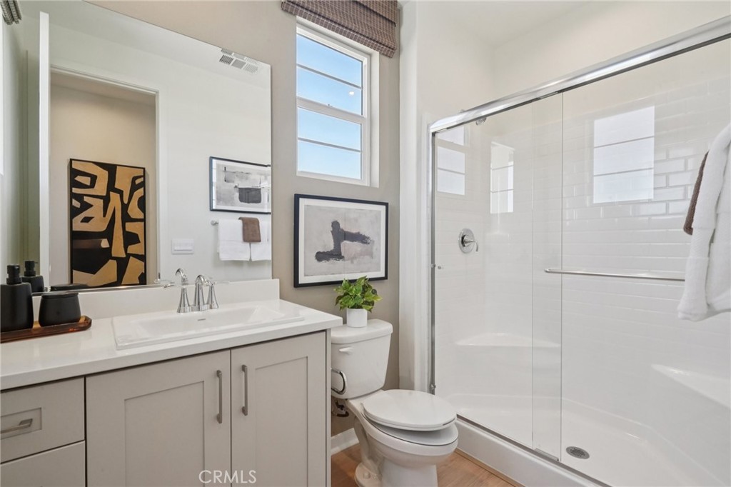 73550 Raphael Drive Palm Desert, CA 92211 - Photo 26 of 41 a bathroom with a sink a toilet and shower