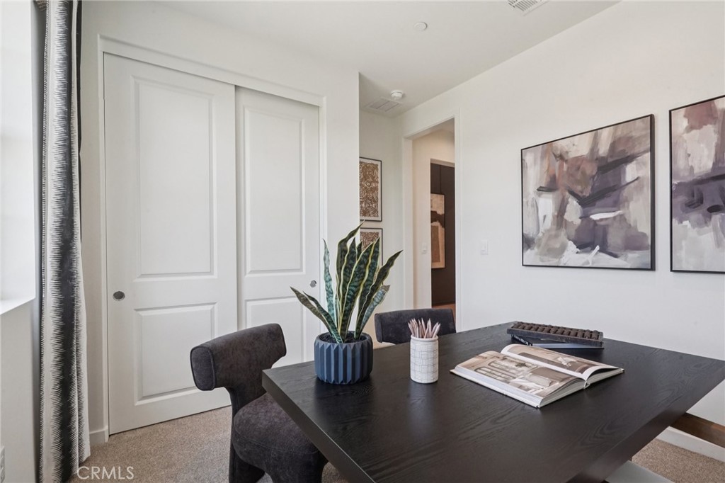 73550 Raphael Drive Palm Desert, CA 92211 - Photo 29 of 41 a view of a workspace with furniture and window