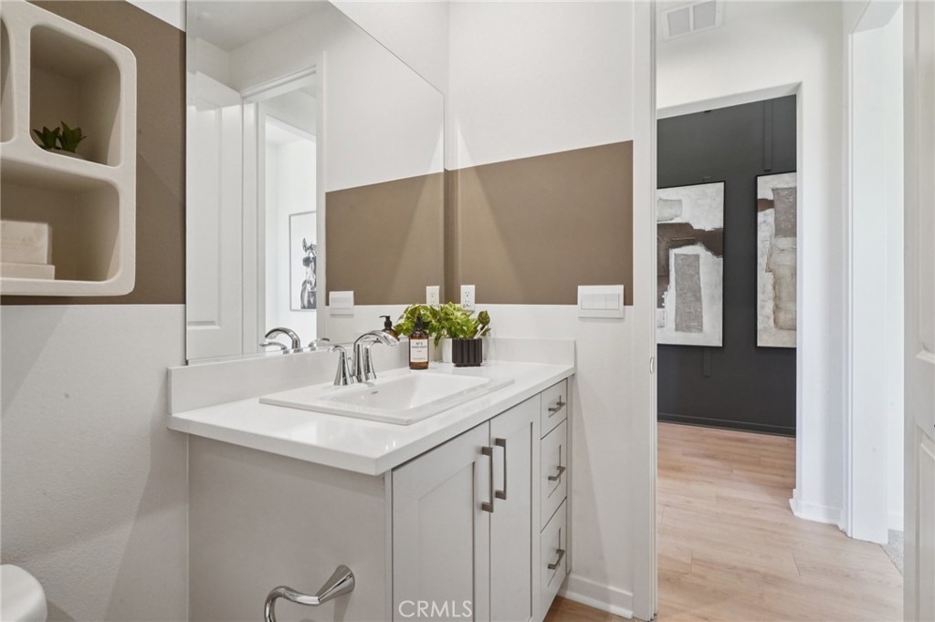 73550 Raphael Drive Palm Desert, CA 92211 - Photo 31 of 41 a bathroom with a sink and a mirror