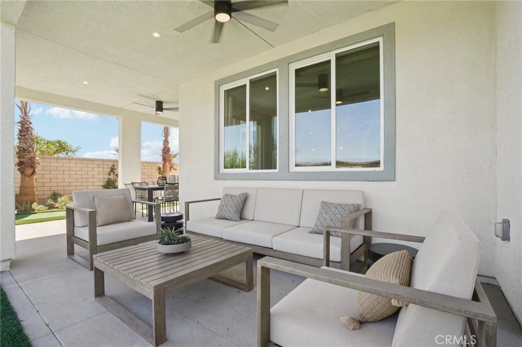 73550 Raphael Drive Palm Desert, CA 92211 - Photo 40 of 41 a living room with furniture and a window