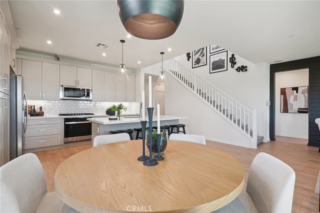 73550 Raphael Drive Palm Desert, CA 92211 - Photo 8 of 41 a kitchen with sink and refrigerator