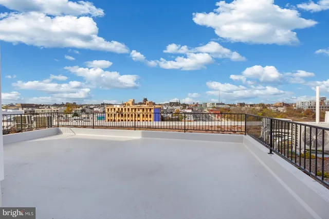 a view of a city with tall buildings