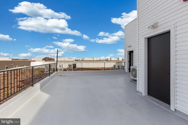 a view of entrance gate of a house