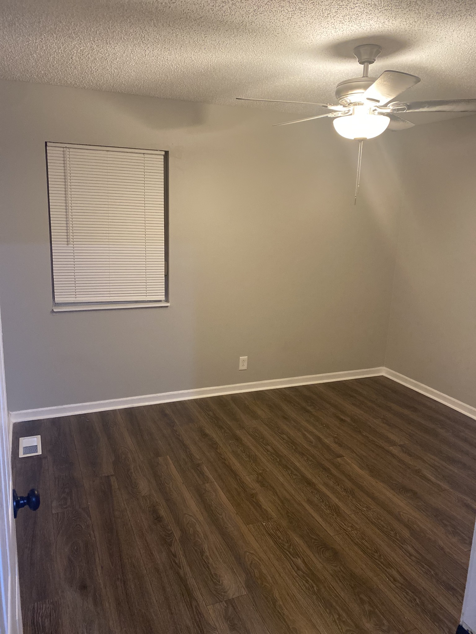 3508 Country Way Road Antioch, TN 37013 - Photo 9 of 11 a view of a room with wooden floor and a ceiling fan