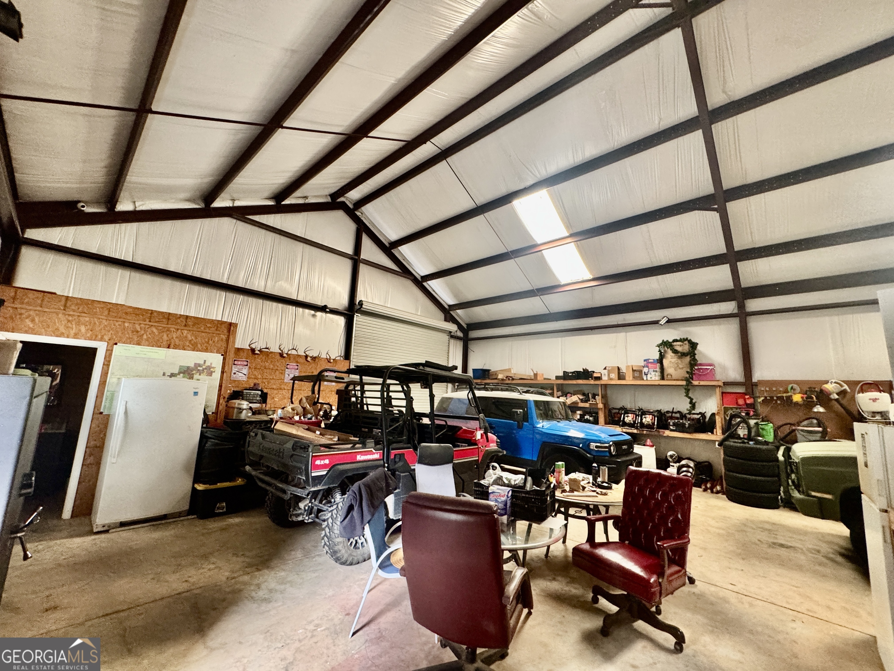 345 Cool Water Road Vienna, GA 31092 - Photo 12 of 41 a view of a storage room with a lot of stuff