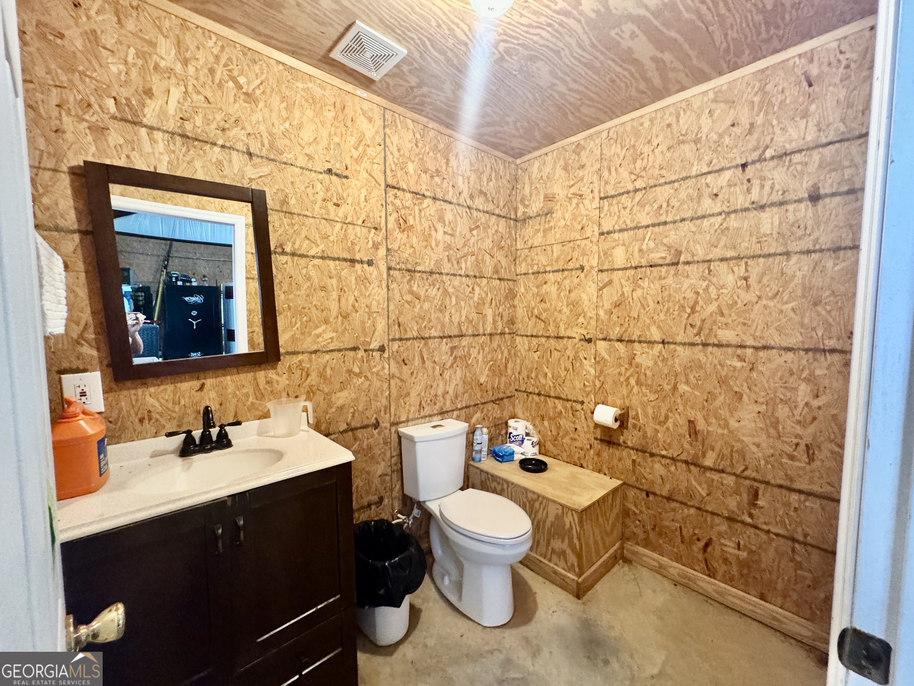 345 Cool Water Road Vienna, GA 31092 - Photo 14 of 41 a bathroom with a sink and a toilet