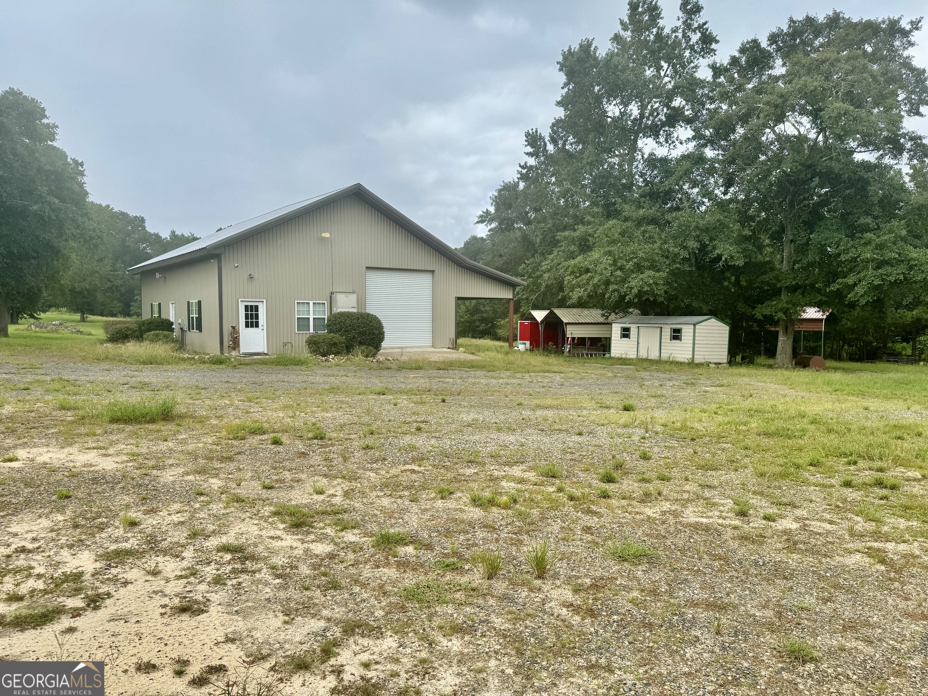 345 Cool Water Road Vienna, GA 31092 - Photo 19 of 41 a view of a house with a yard