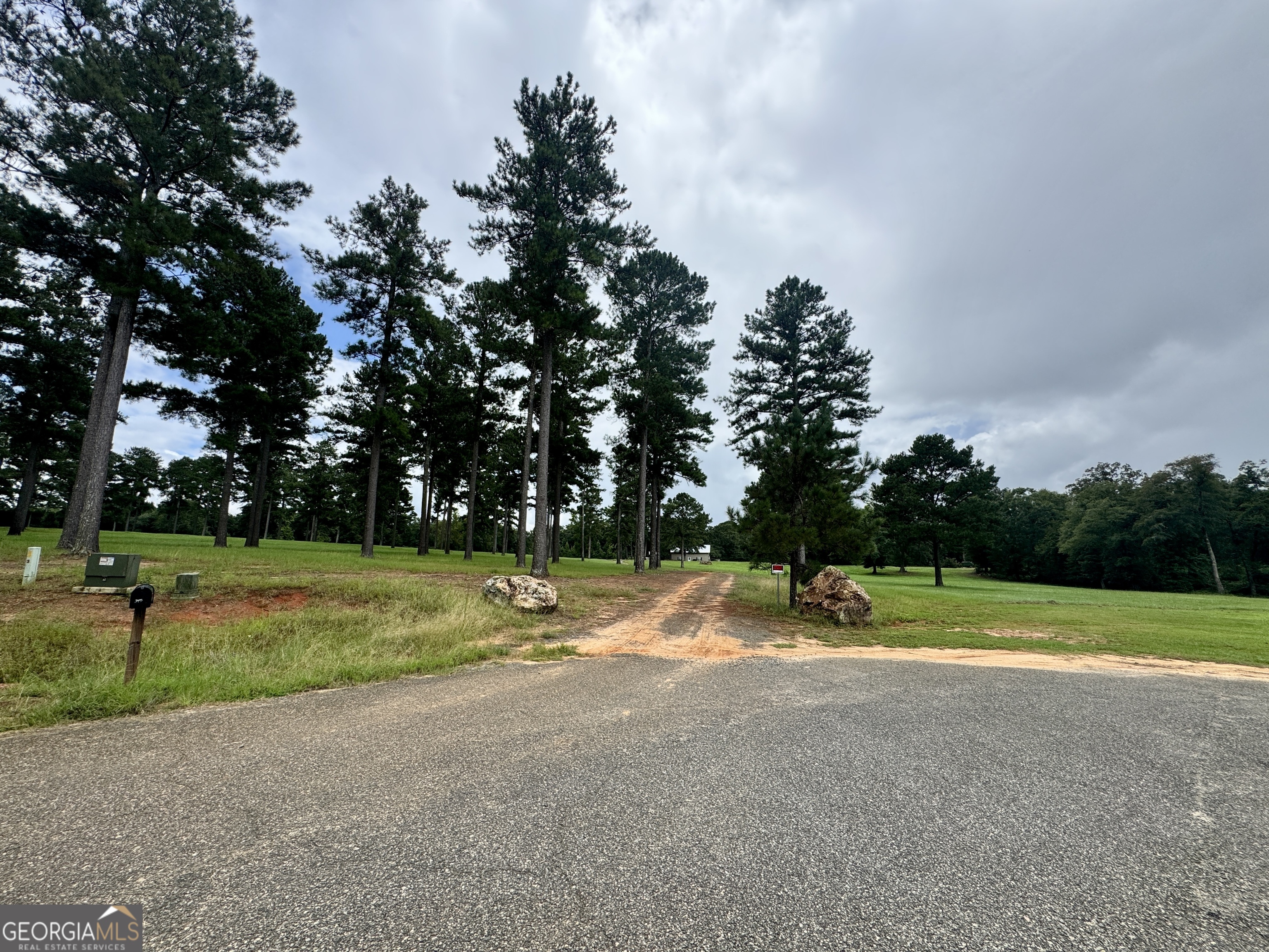 345 Cool Water Road Vienna, GA 31092 - Photo 2 of 41 a view of a playground with basketball court