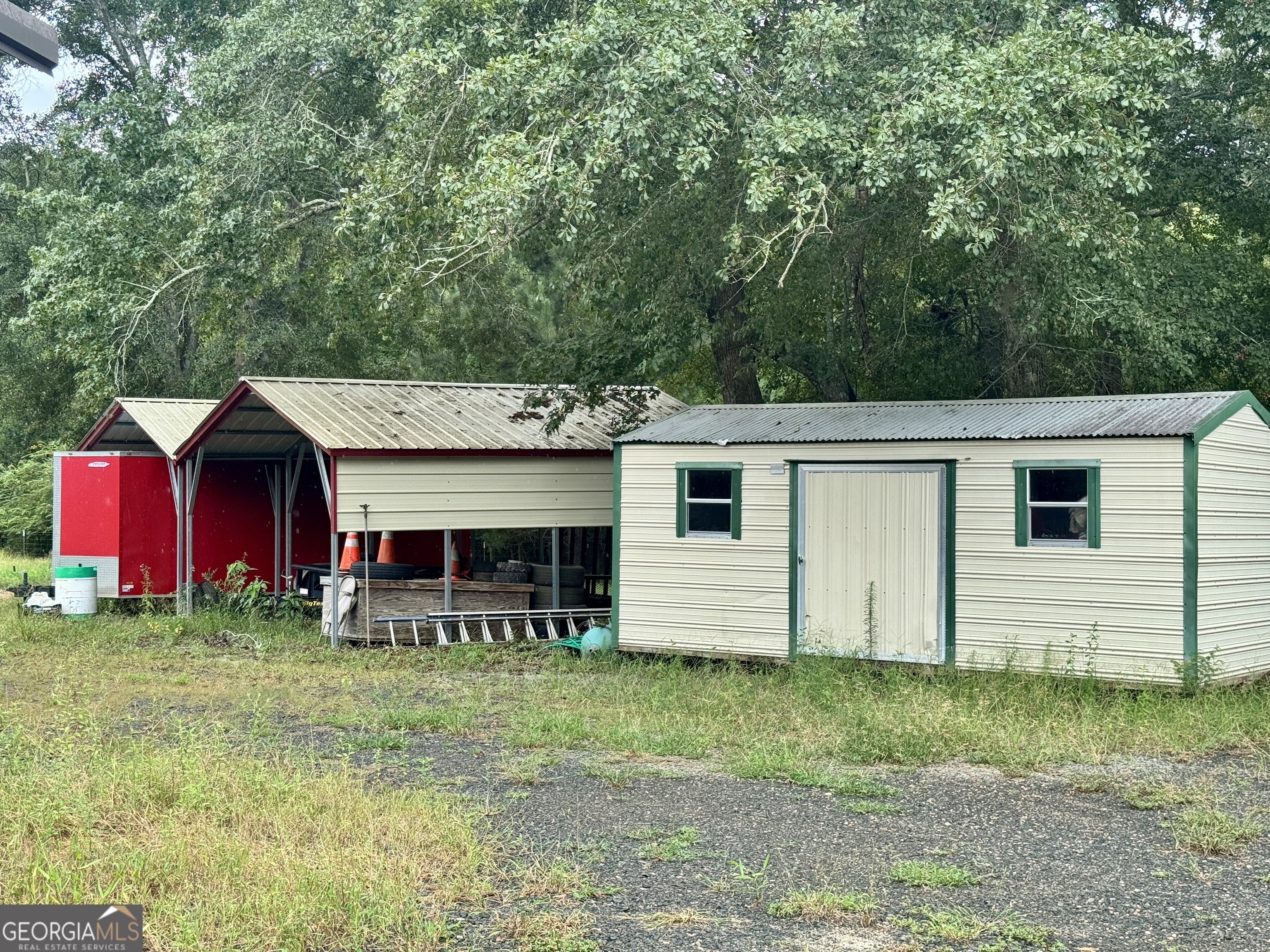 345 Cool Water Road Vienna, GA 31092 - Photo 7 of 41 a view of a house with a yard