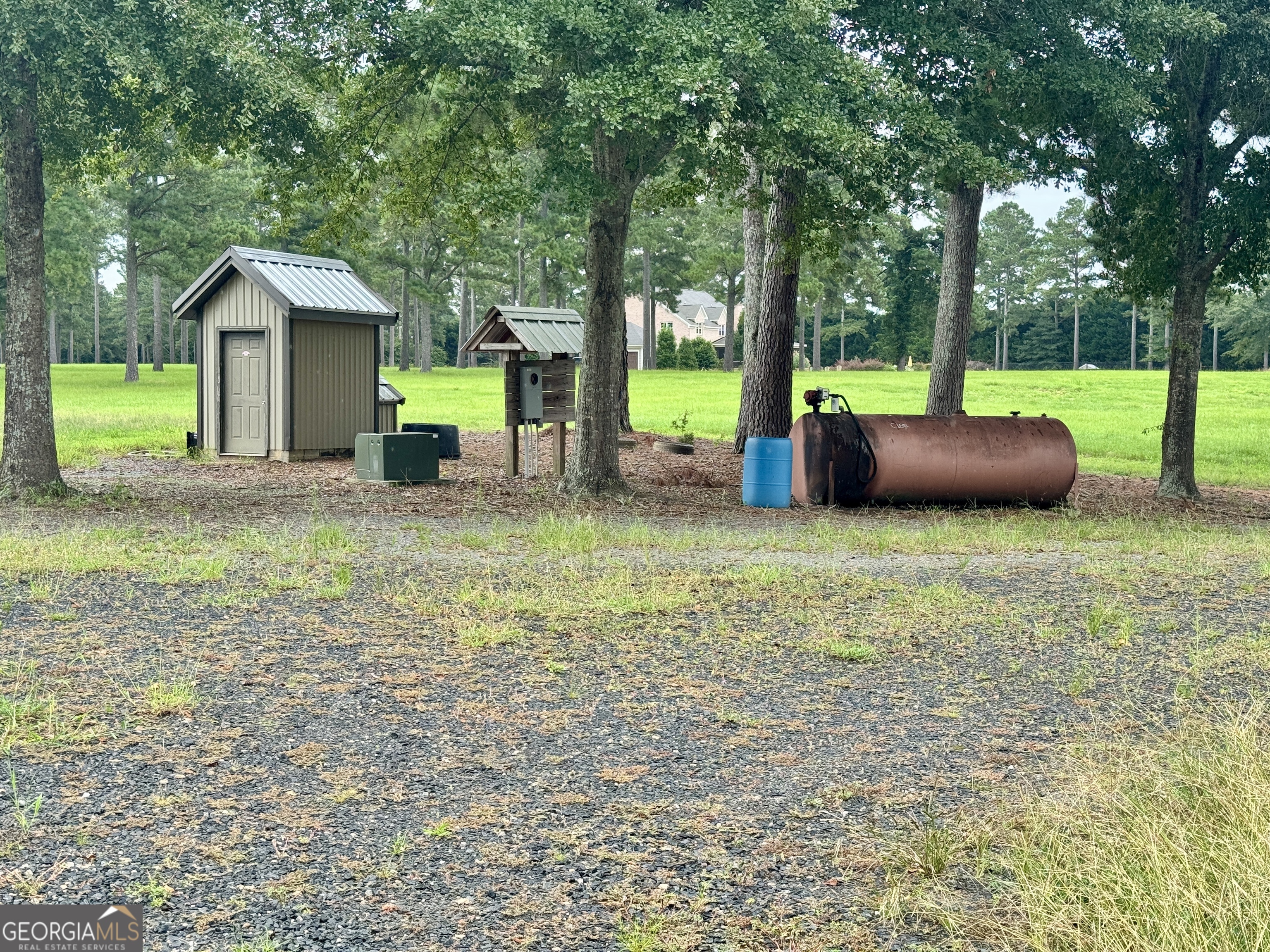 345 Cool Water Road Vienna, GA 31092 - Photo 8 of 41 a view of a house with backyard and trees