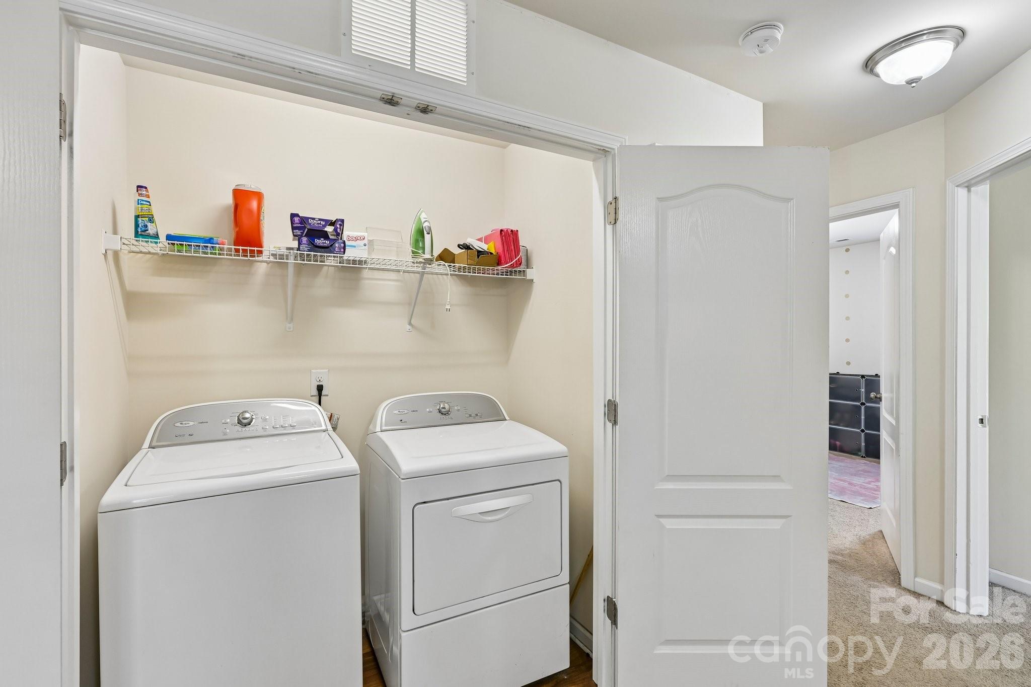 2206 Turtle Point Road Charlotte, NC 28262 - Photo 26 of 28 a utility room with dryer and washer