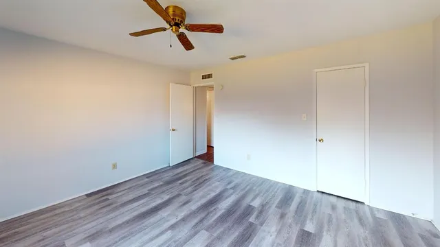 a view of room with hardwood floor