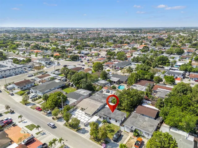 an aerial view of a city with lots of residential buildings