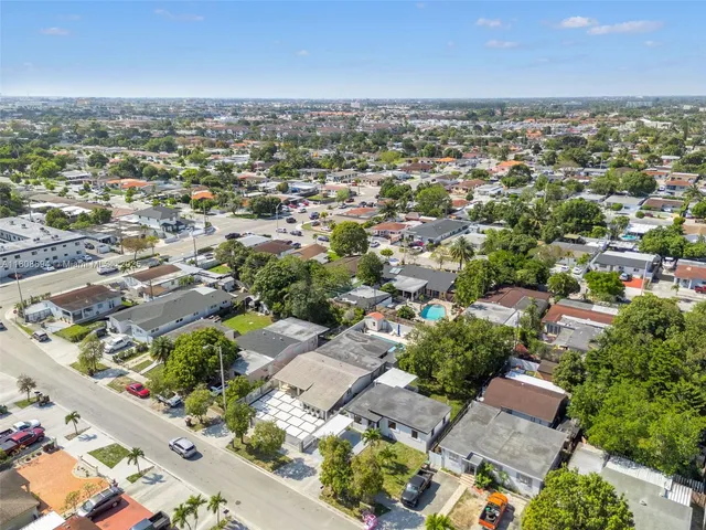 an aerial view of a city with lots of residential buildings