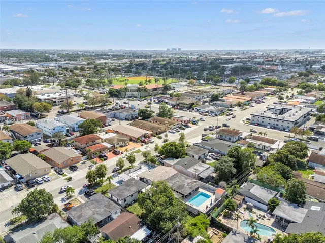 an aerial view of a city with lots of residential buildings