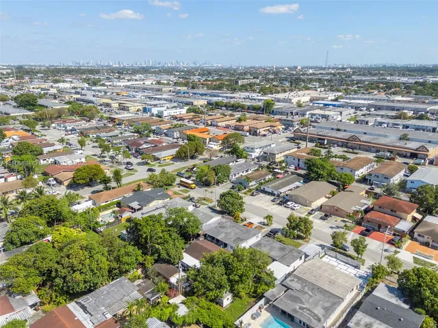 an aerial view of a city with lots of residential buildings