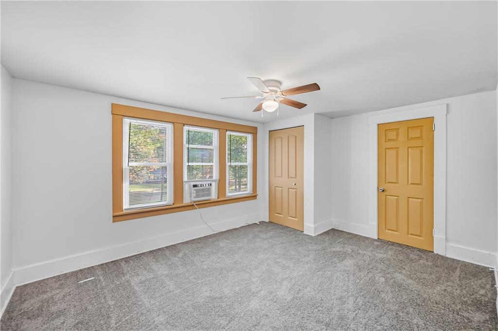 1039 North Keel Ridge Road Hermitage, PA 16148 - Photo 28 of 47 an empty room with windows and closet