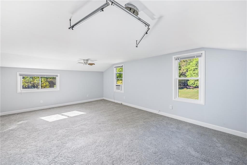 1039 North Keel Ridge Road Hermitage, PA 16148 - Photo 32 of 47 a view of an empty room with a window