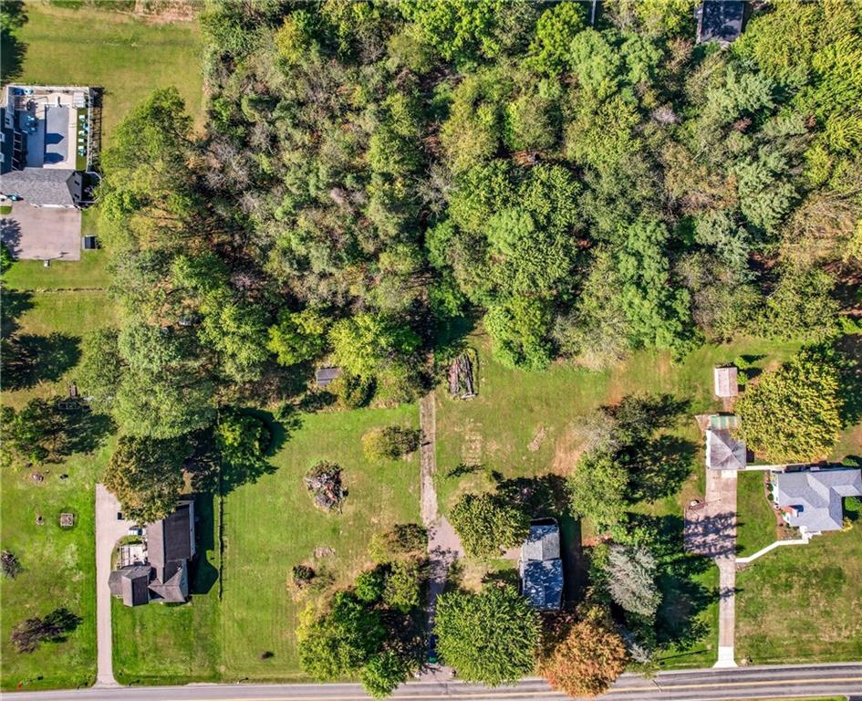 1039 North Keel Ridge Road Hermitage, PA 16148 - Photo 39 of 47 an aerial view of residential houses with outdoor space and trees