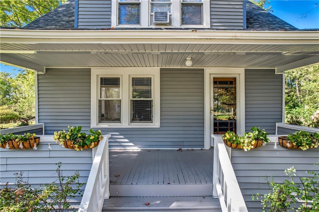 1039 North Keel Ridge Road Hermitage, PA 16148 - Photo 4 of 47 a front view of a house with a large window