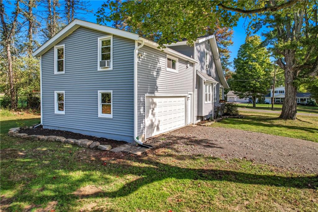 1039 North Keel Ridge Road Hermitage, PA 16148 - Photo 42 of 47 a view of a house with a yard