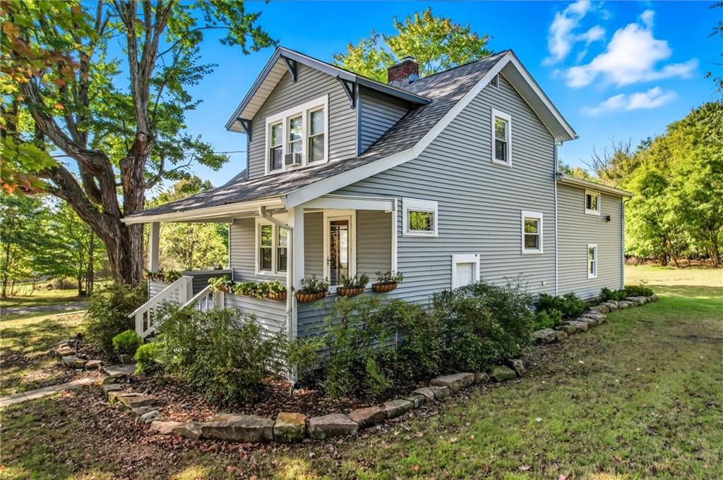 1039 North Keel Ridge Road Hermitage, PA 16148 - Photo 46 of 47 a front view of a house with garden