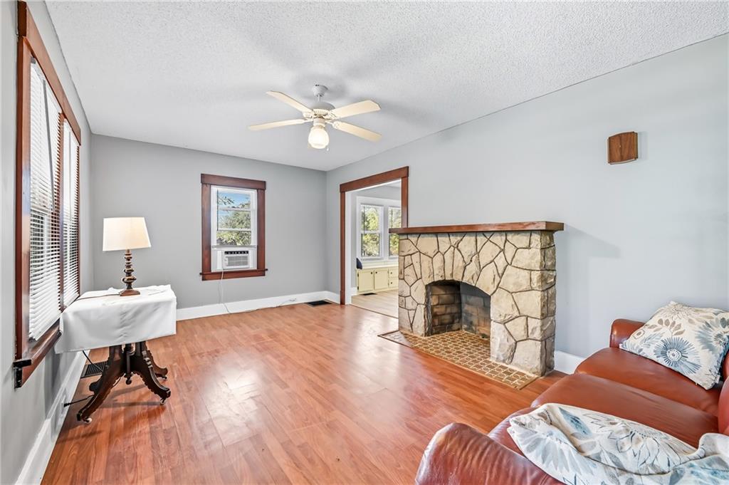 1039 North Keel Ridge Road Hermitage, PA 16148 - Photo 8 of 47 a living room with furniture and a fireplace