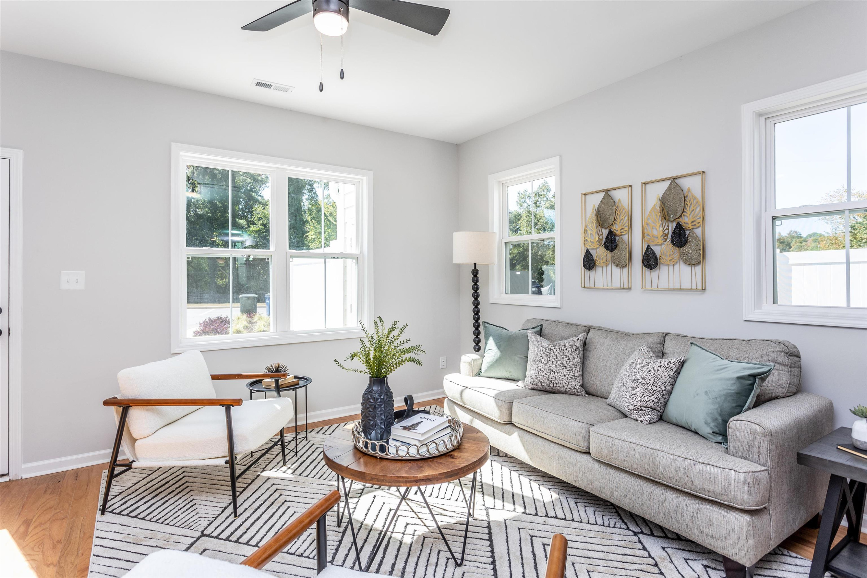 622 Rush Street Raleigh, NC 27610 - Photo 12 of 26 a living room with furniture and a large window