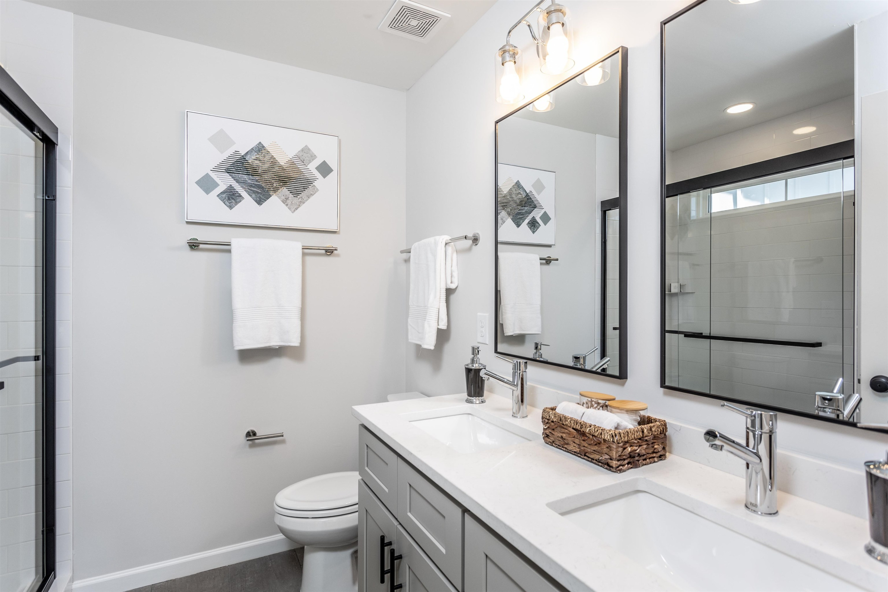 622 Rush Street Raleigh, NC 27610 - Photo 17 of 26 a bathroom with a sink and a mirror with toilet