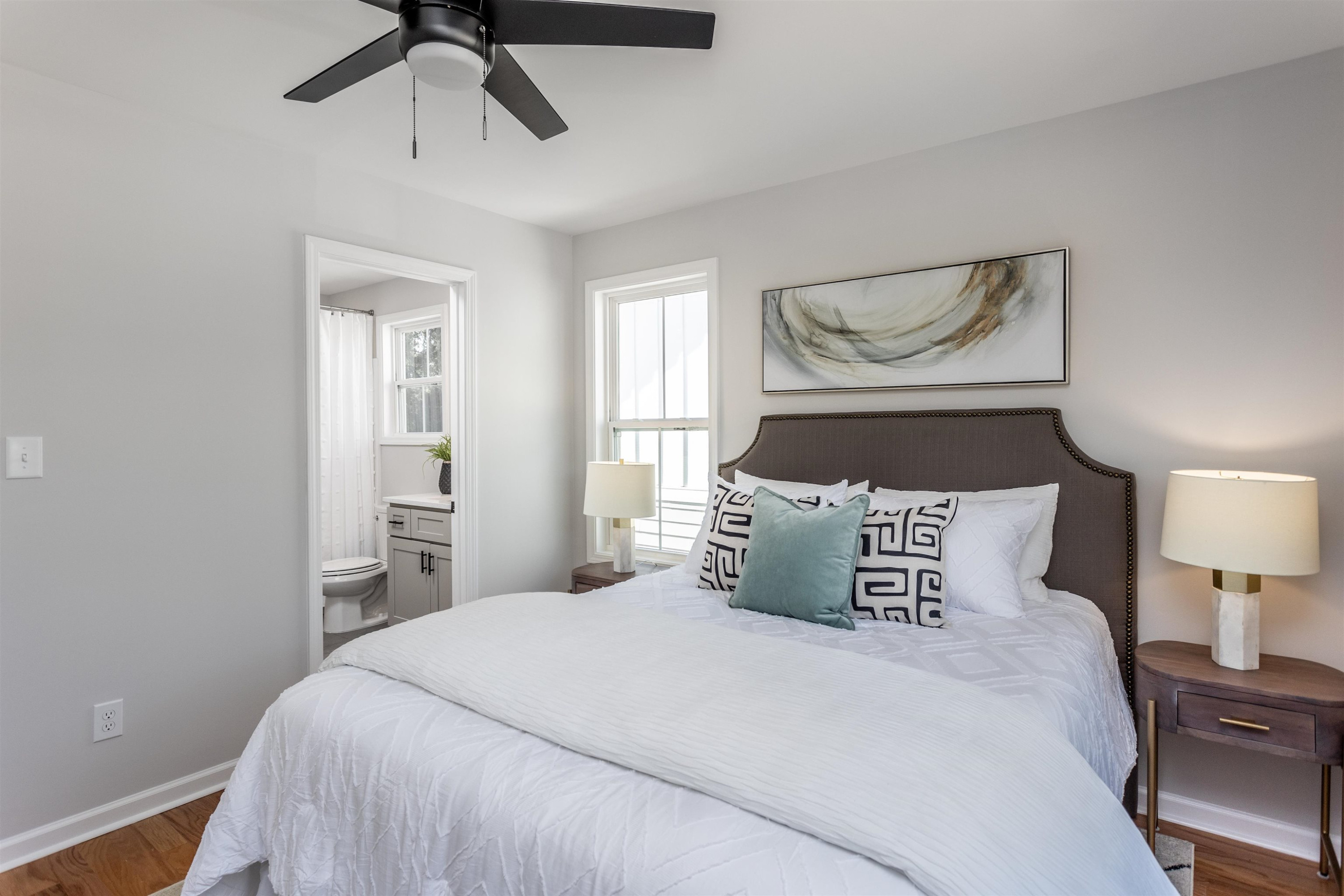 622 Rush Street Raleigh, NC 27610 - Photo 19 of 26 a bedroom with a bed and window