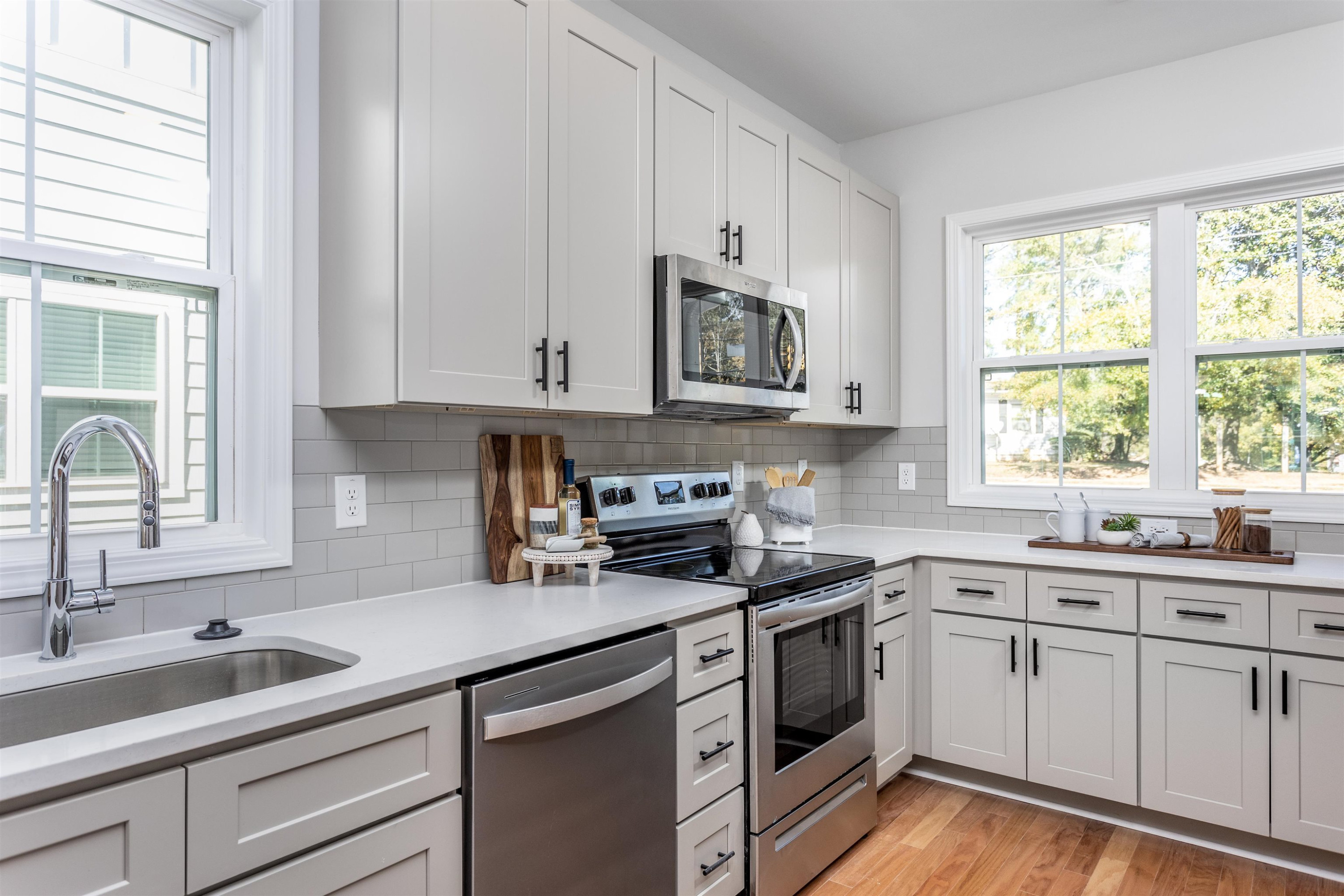 622 Rush Street Raleigh, NC 27610 - Photo 4 of 26 a kitchen with appliances cabinets and a sink