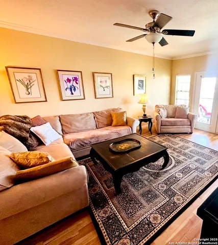 a living room with furniture and a rug