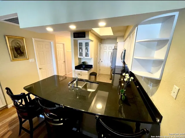 a view of a dining room with furniture