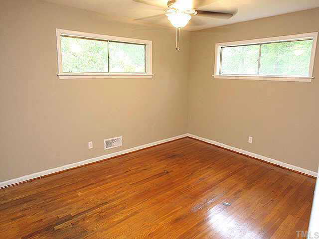 3318 Scott Drive Raleigh, NC 27604 - Photo 2 of 10 Nice size master bedroom with hardwoods and neutral colors!