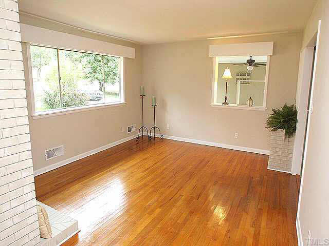 3318 Scott Drive Raleigh, NC 27604 - Photo 5 of 10 Another view of the beautiful living room!