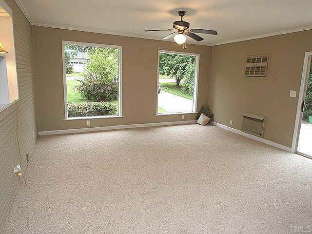 3318 Scott Drive Raleigh, NC 27604 - Photo 7 of 10 Great family room with new carpet and neutral colors. Huge room with lots of windows for light and perfect for that plasma TV you have always wanted!!