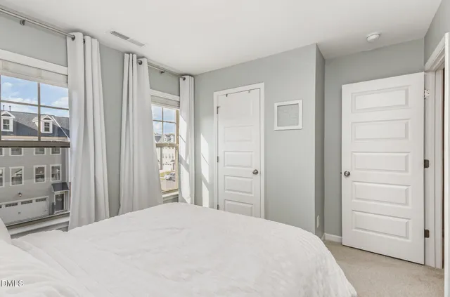 a bathroom with a sink vanity and mirror