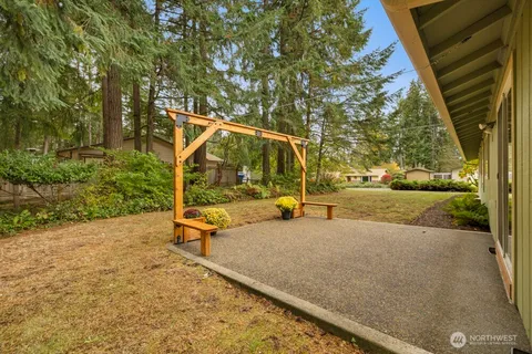 a view of swimming pool with a patio
