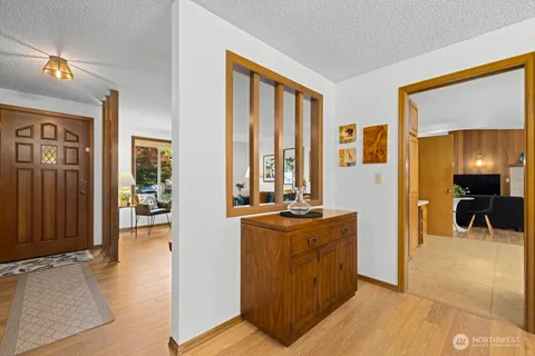a view of a livingroom with furniture and windows
