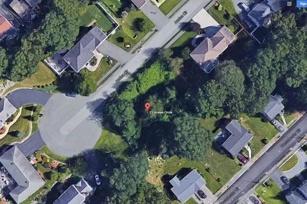an aerial view of residential house with outdoor space and swimming pool