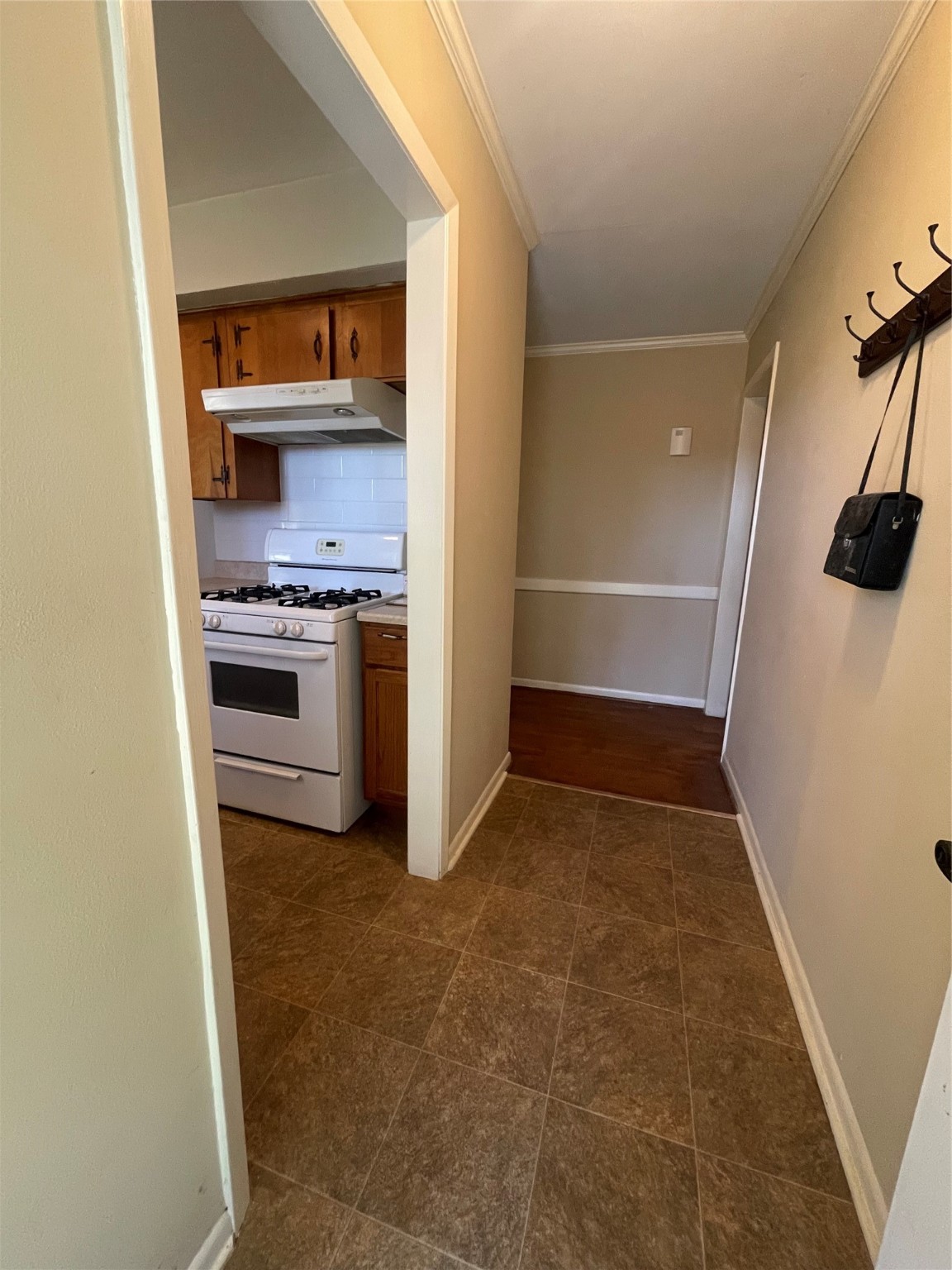 490 Cemetery Road Coldspring, TX 77331 - Photo 5 of 25 Entry way into home and opening to the kitchen