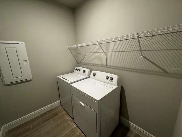 a utility room with dryer and washer